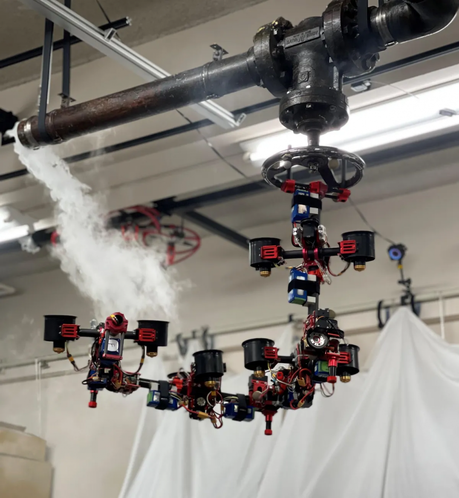 空中机器人将自己重新配置成飞行机械手